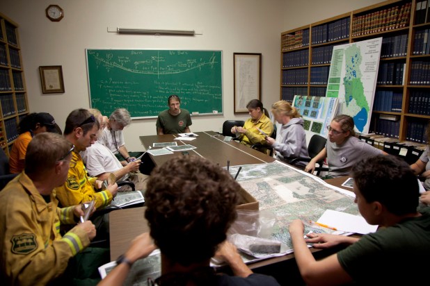 Before the burn, the crew meets to go over the plan and safety.